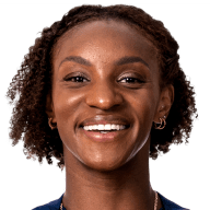 Crystal Dunn smiles for the camera, arms folded