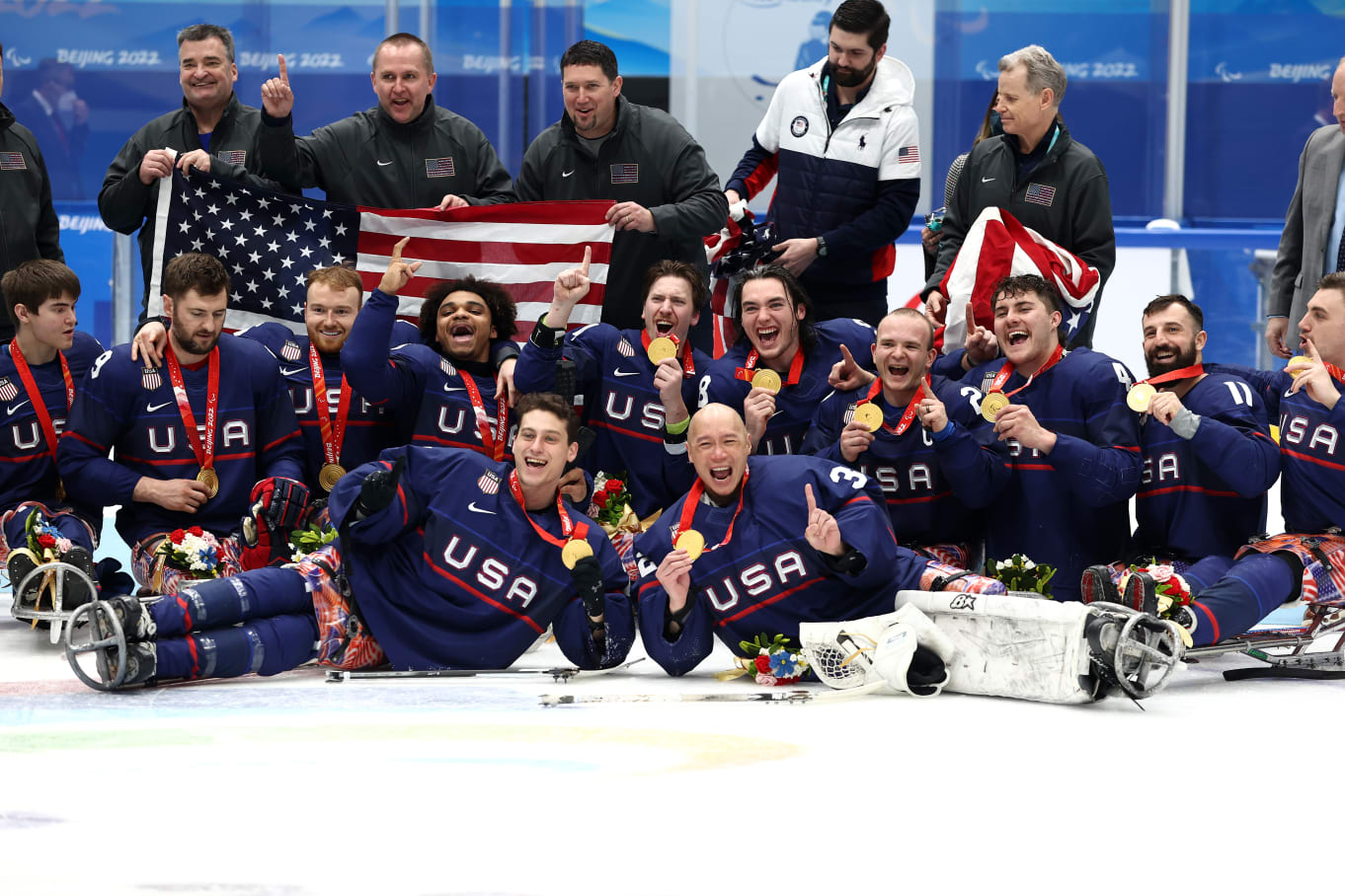 Gold medal winners Team USA celebrate during the Para Ice Hockey medal ceremony at the Beijing 2022 Winter Paralympics