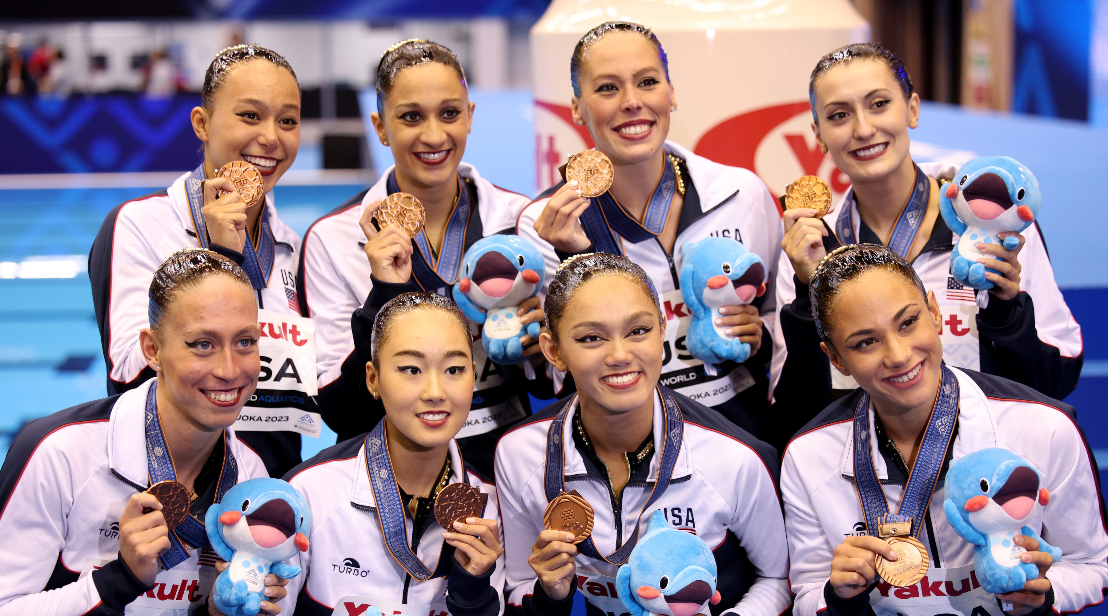 Team United States hold up their medals and pose for photographers during the medal ceremony for the Artistic Swimming Team Technical Final at the Fukuoka 2023 World Aquatics Championships on July 18, 2023 in Fukuoka, Japan.