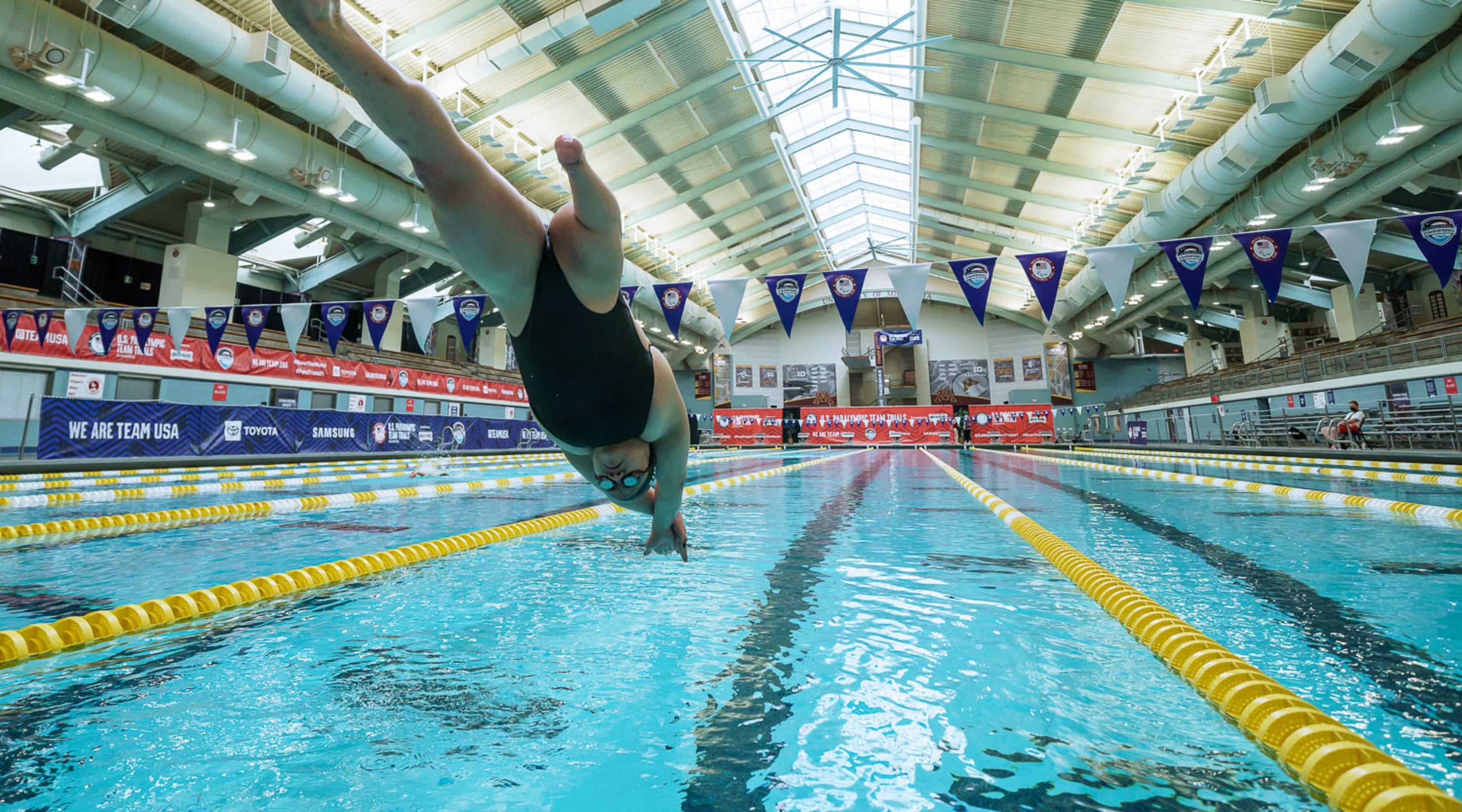 Mei Mei White dives into the pool at the 2020 U.S. Paralympic Team Trials.