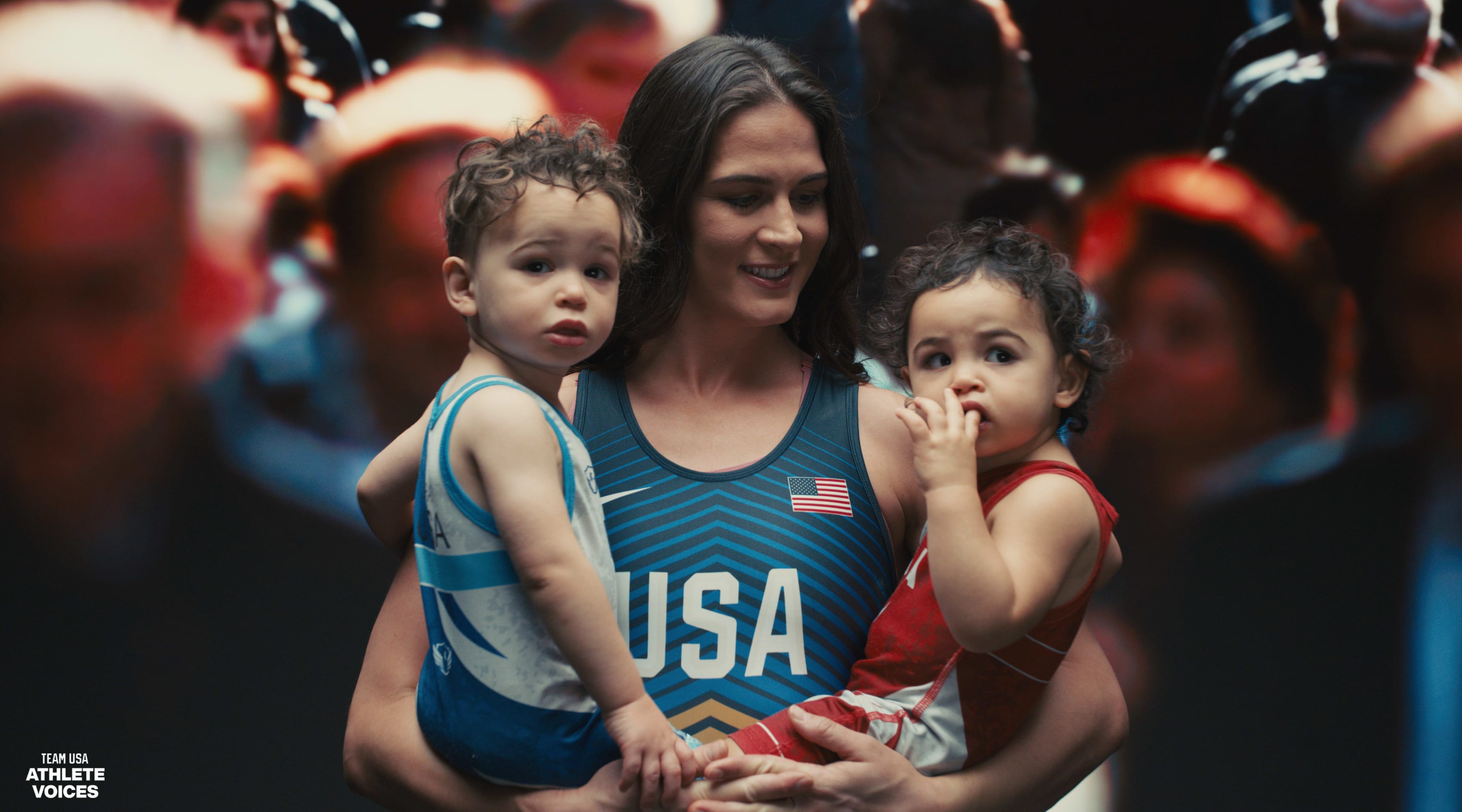 Adeline Gray poses on set with her twins at a shoot for Team USA in Los Angeles, California.