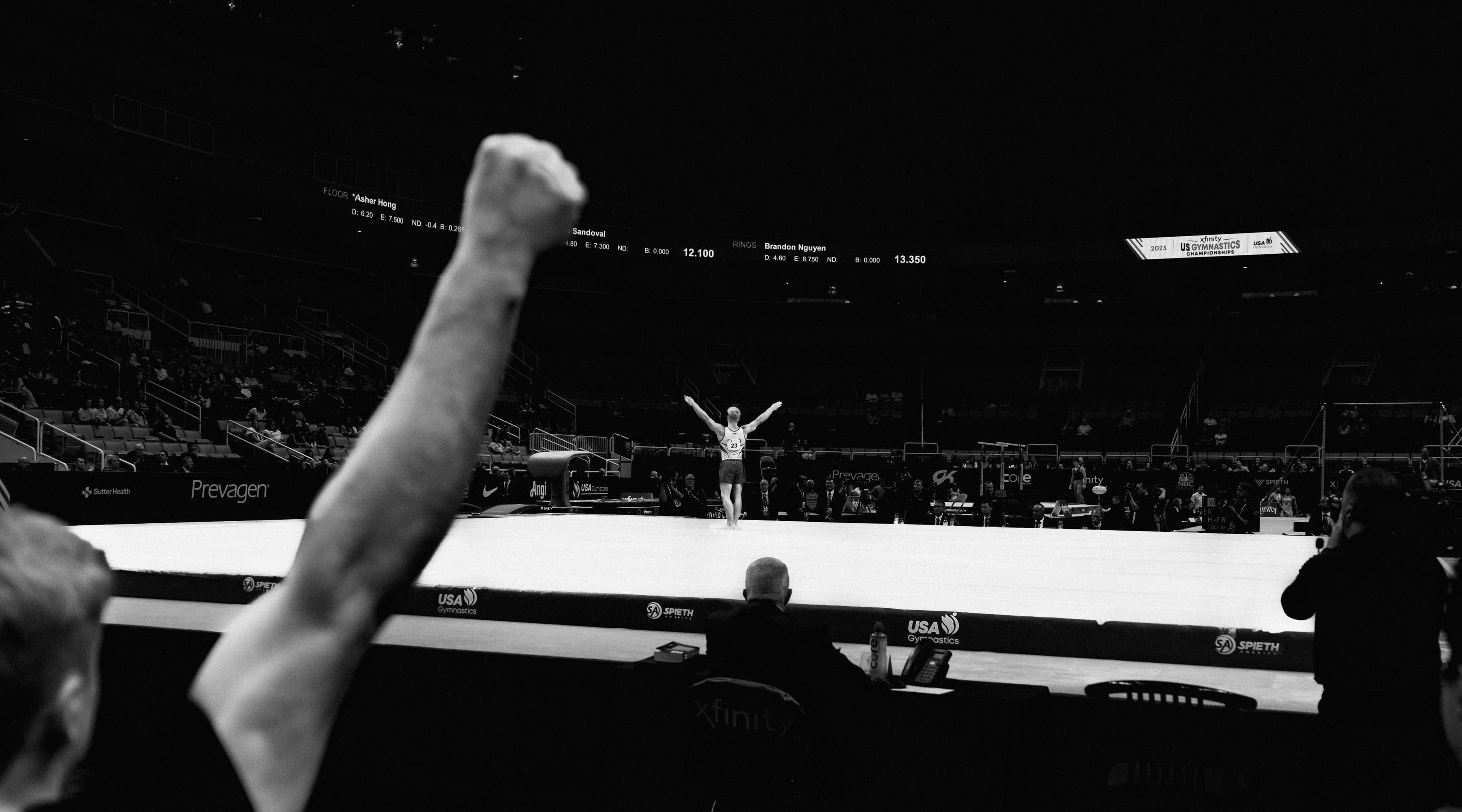 Stanford Mens Gymnastics Team looks on as Colt Walker of Stanford completes his floor routine on night 1 of the US Gymnastics Championship 2023 in San Jose, California