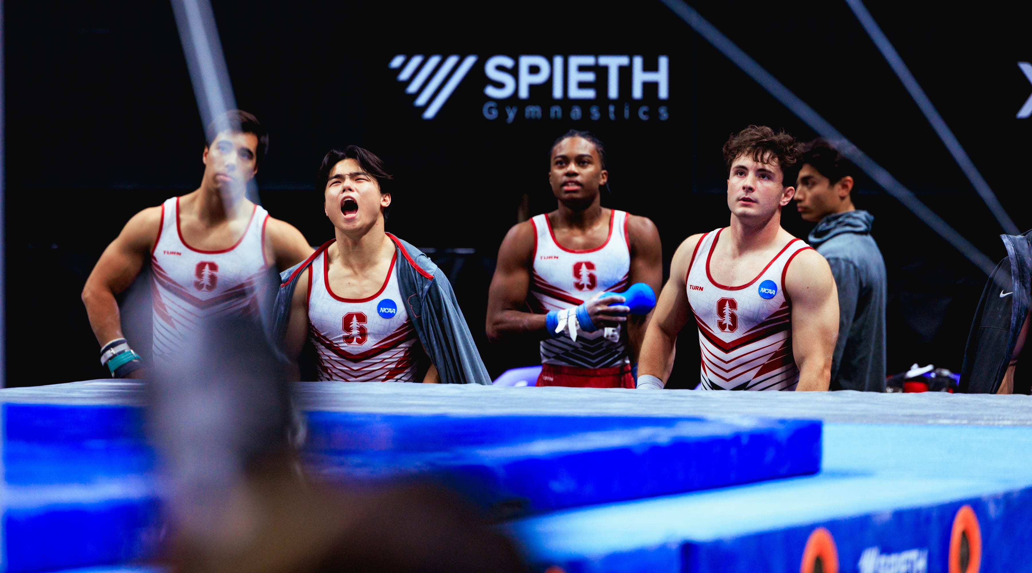 Members of the Stanford Mens Gymnastics team cheer on their team mate at the US Gymnastics Championship 2023 in San Jose, California.