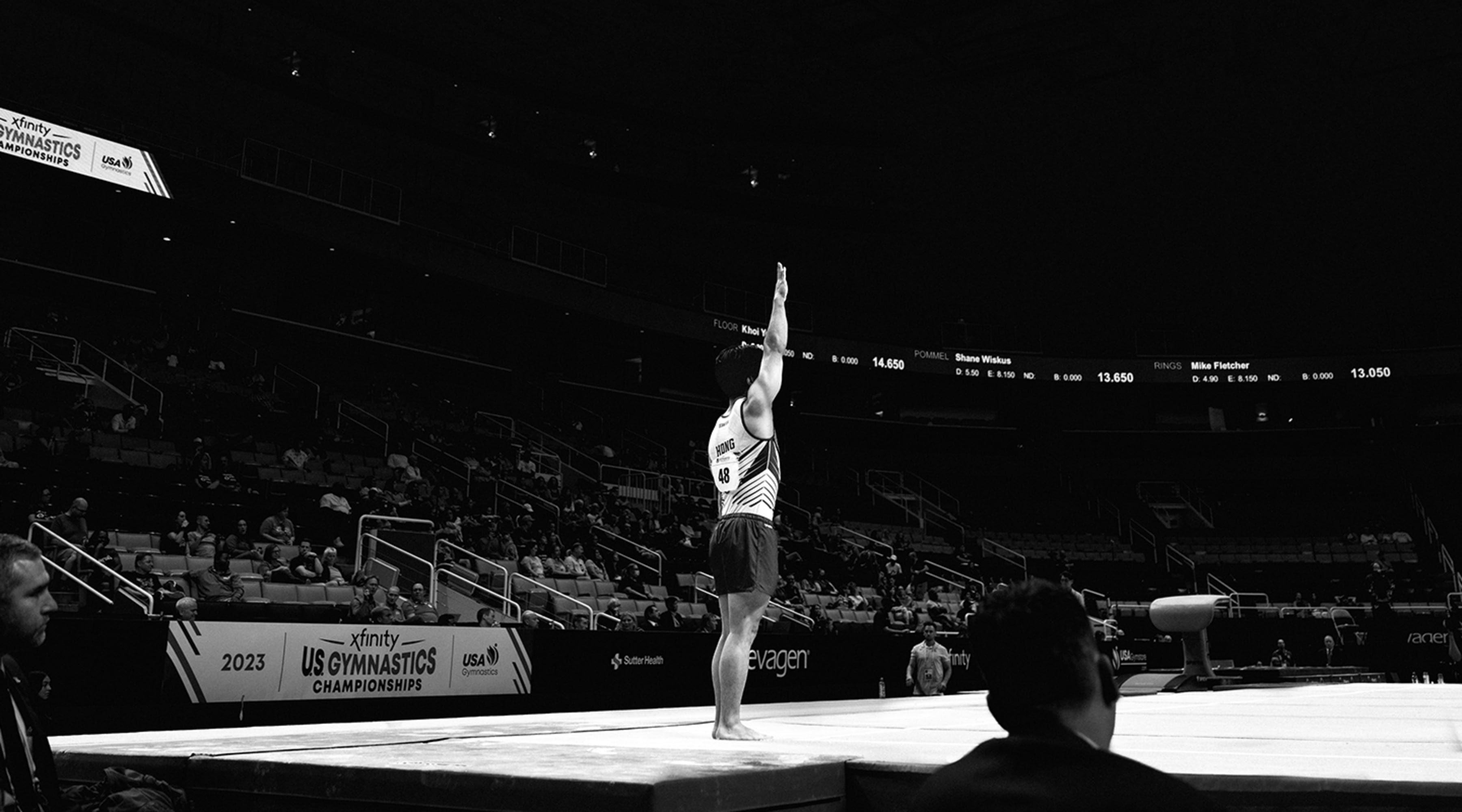 Asher Hong of Stanford Mens Gymnastics stands on the floor as he prepares to start his routine on night 1 of the US Gymnastics Championships 2023 in San Jose, California.