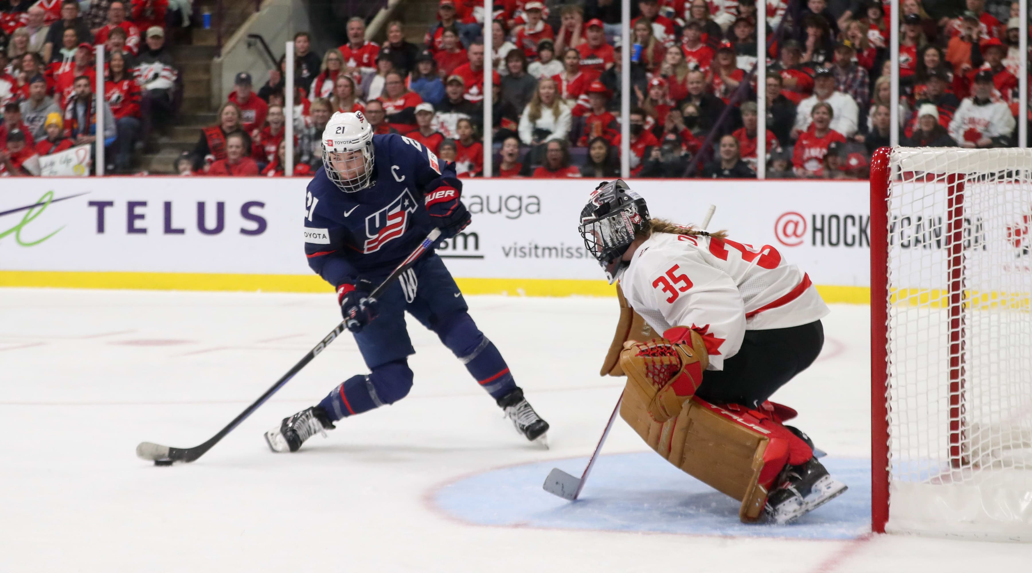 Hilary Knight hits a shot.