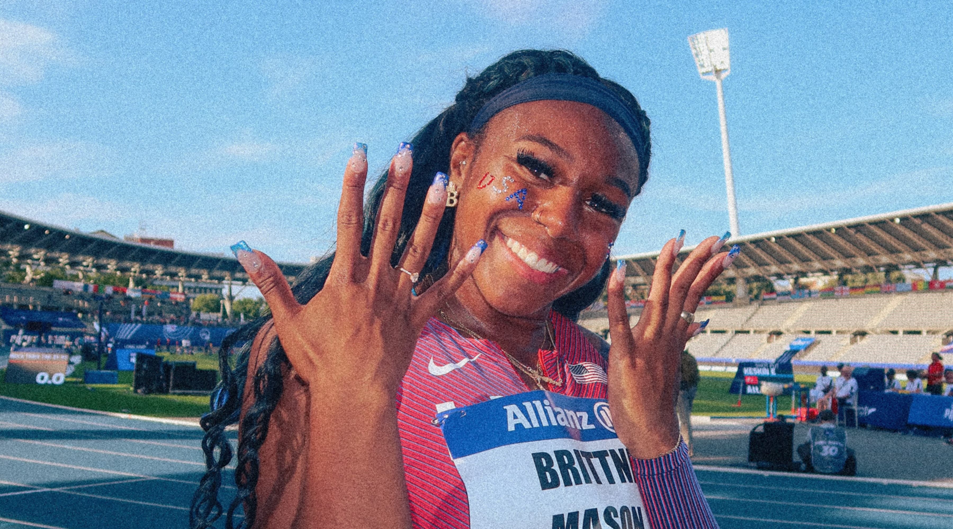 Brittni Mason poses for the camera on the track