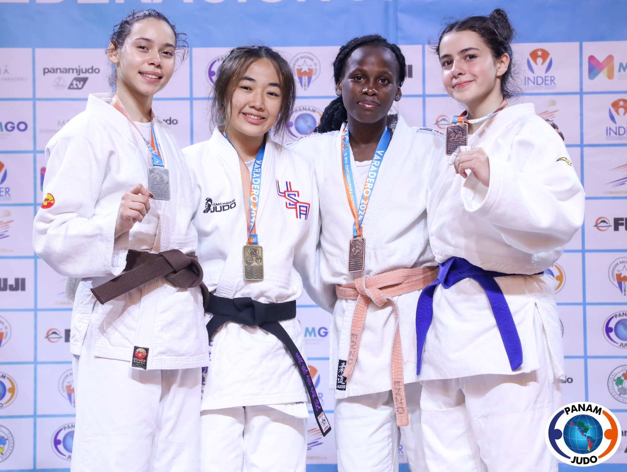 Team USA's Logyn Puahala (2nd from left) won gold in the female 44 kg division. (Photo by Pan Am Judo)