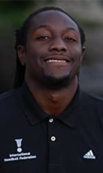 Headshot of Ebiye Udo-Udoma, USATH Board Member