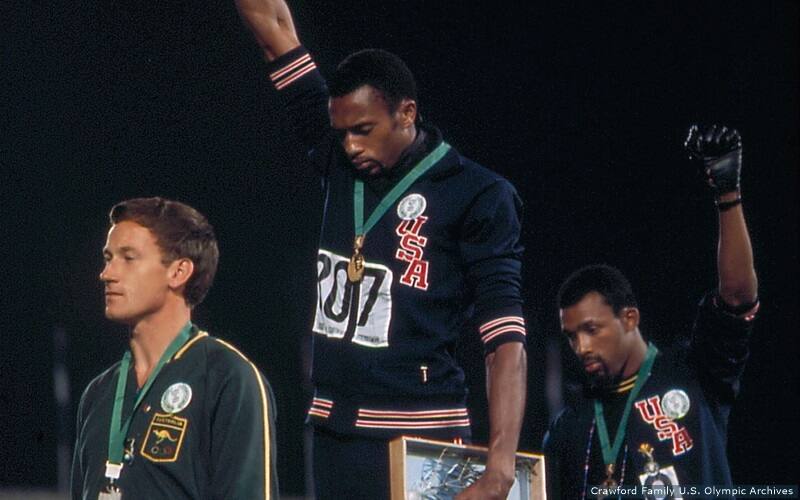 Tommie Smith and John Carlos raise their fists on the podium at the 1968 Olympic Games in Mexico City.