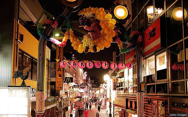 Takeshita Street glows under bright lights in March 2011.