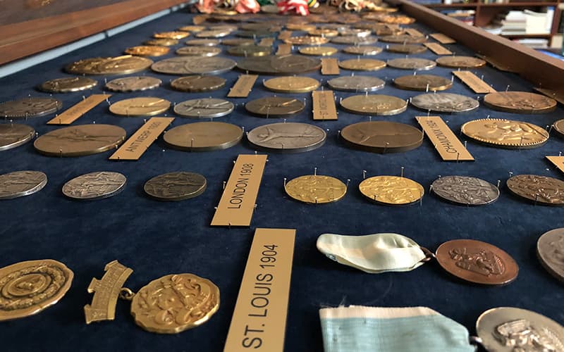 Gordy Crawford's participation medals on display at his home in Los Angeles, California. Crawford donated his collection to the U.S. Olympic Committee in August 2018.