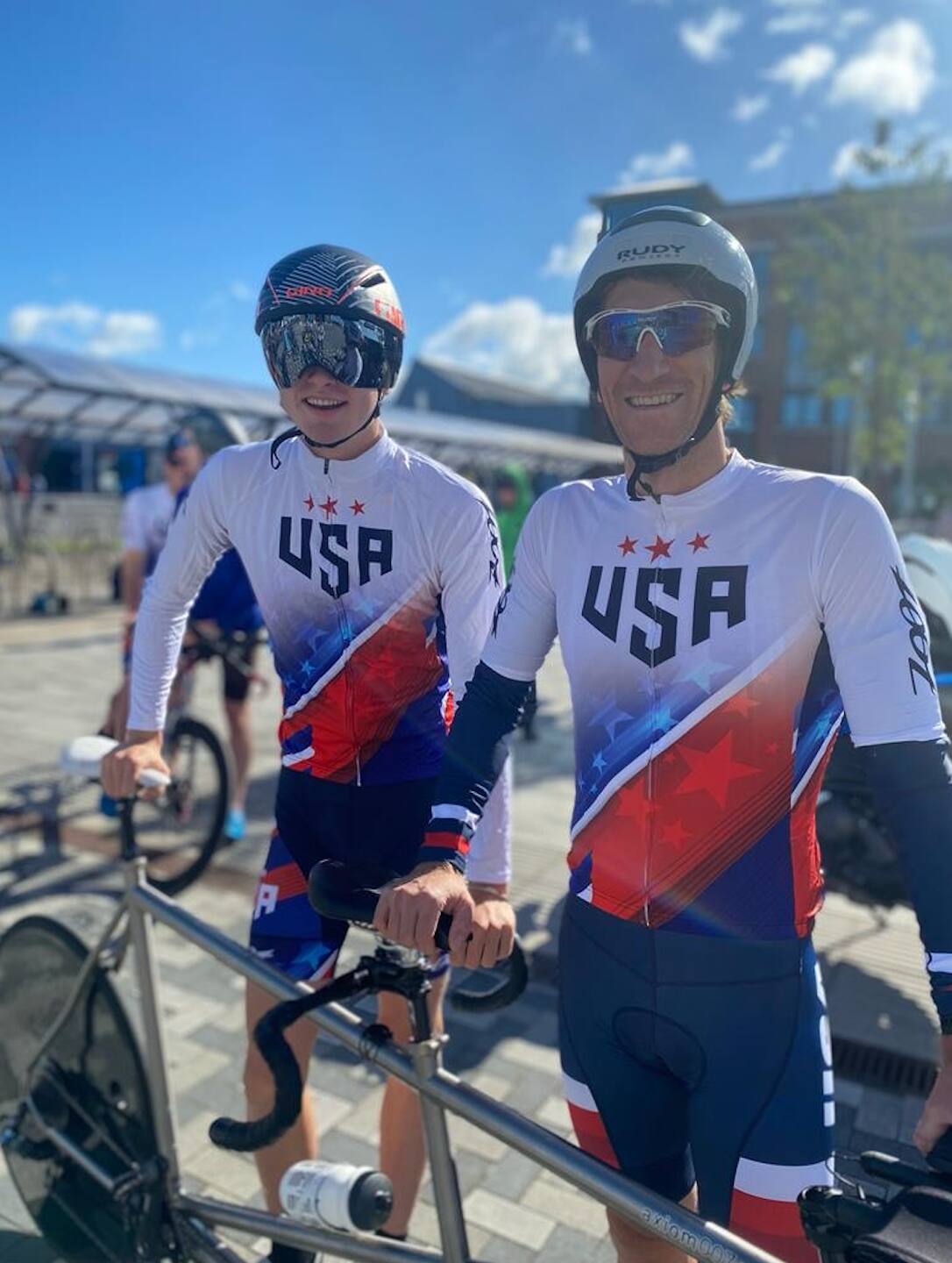 paratriathlete Owen cravens poses with his guide Colin Riley