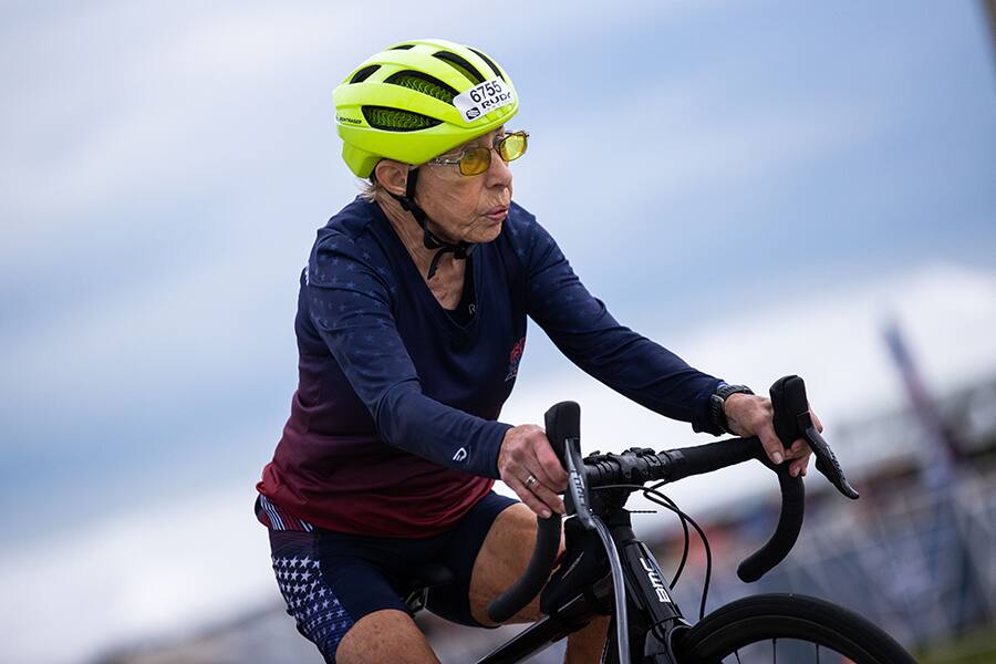 An athlete rides during the cycling portion of a race.