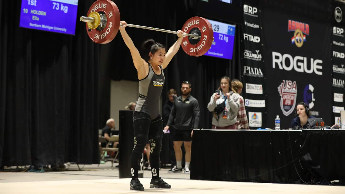 Ella Holden of Northern Michigan University completes a snatch at the 2022 National University Championships