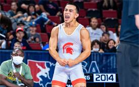 Peyton Omania celebrates with a flex after winning 2021 World Team Trials