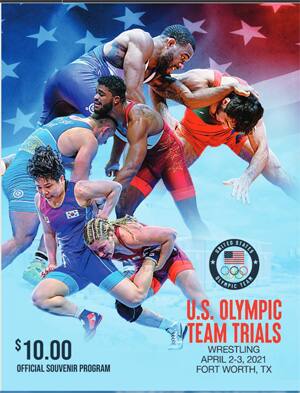 Photos of Jordan Burroughs, G'Angelo Hancock and Helen Maroulis are on the cover of the event program for the U.S. Olympic Team Trials.