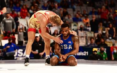 Kyle Dake consoles Jordan Burroughs after beating him in Olympic Trials finals.