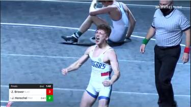 Zeth Brower of Clackamas celebrates after winning 133 pound NJCAA title