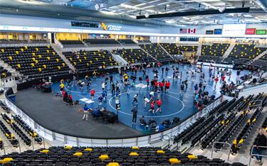Xtream Arena in Coralville, Iowa with eight mats down for NWCA Div. III Coaches Association Nationals