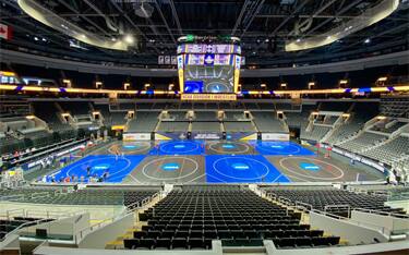 View of the eight mats for the 2021 NCAA Wrestling Championships in the empty arena in St. Louis