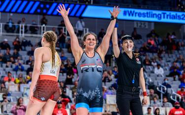 Adeline Gray raises both arms in victory at the U.S. Olympic Team Trials in Fort Worth, Texas