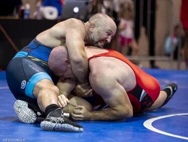 Jake Clark works a head pinch at the Masters Greco-Roman Nationals