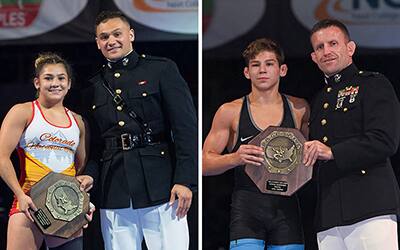 Two national champions from Fargo posing with a U.S. Marine and their championship stop sign trophy