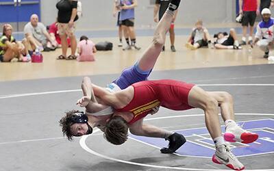 Nolan Fellers (IA) launches Blue Stiffler (SC) in the 62 kg Greco-Roman finals at the U15 Pan American Team Trials.