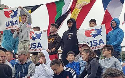 United States soldiers cheer from Team USA during the 2022 Beach World Series Final in Romania