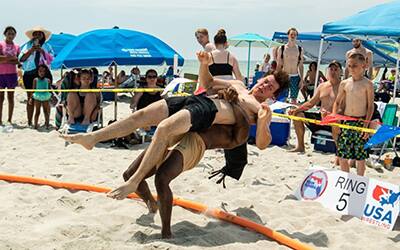 Jabari Irons tosses an opponent at the 2022 U.S. Beach Nationals