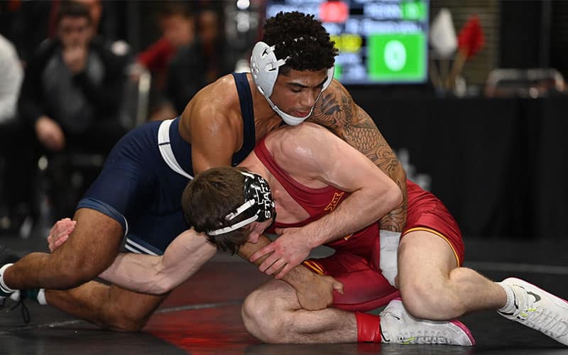 Roman Bravo-Young (Penn State) controls Ramazan Attasauov (Iowa State) at Collegiate Duals.