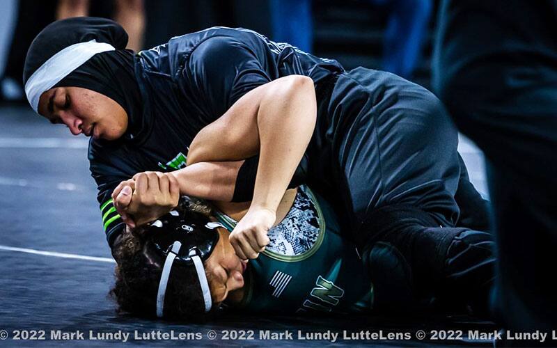 Latifah McBryde (Life) battles Erin Martin (Tiffin) at the Soldier Salute.