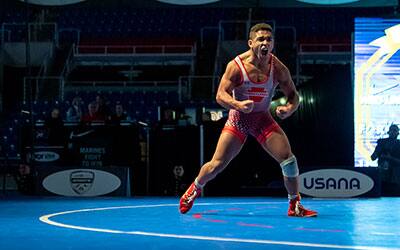 Mason Gibson of Pennsylvania flexes out after winning Junior Men's Freestyle Nationals