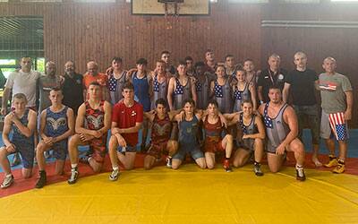 USA and Slovenia athletes pose together