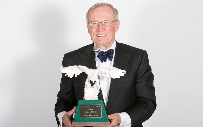 Arno Niemand with his Order of Merit trophy from the National Wrestling Hall of Fame