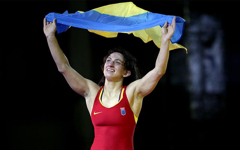 Yulia Tkach Ostapchuk (Ukraine) with the Ukrainian flag