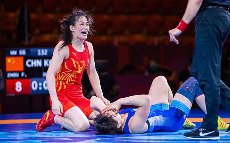 Feng Zhou (China) celebrates a victory.