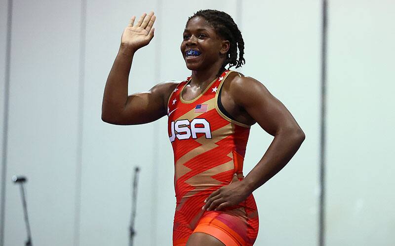 Dymond Guilford (USA) waves to the crowd.