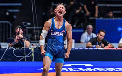 Max Nowry (USA) celebrates after getting a pin at the World Wrestling Championships.