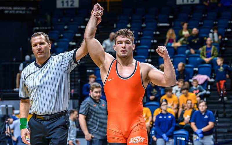 Travis Wittlake (Oklahoma State) with arm raised in victory at the 2022 Southern Scuffle.