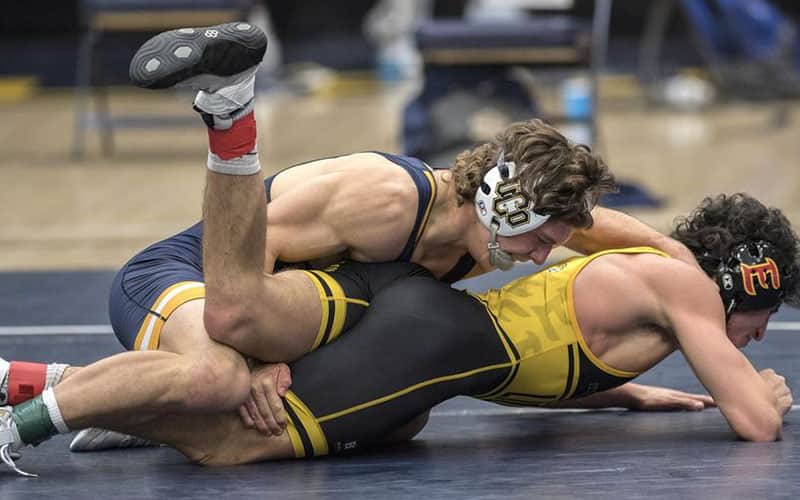 UCO wrestler controls his opponent from top position.
