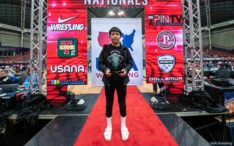 16U 113-pound champion and Outstanding Wrestler recipient Linden Phetxoumphone of Iowa.