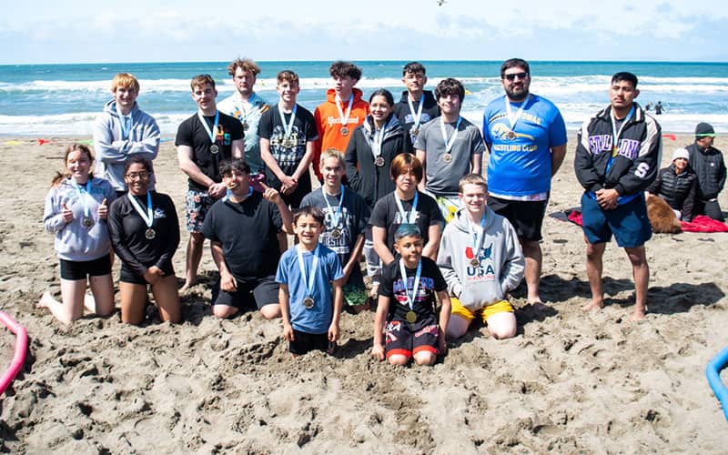 Medal winners from the Cali Beach Wrestling Kick Off in Pacifica, Calif.
