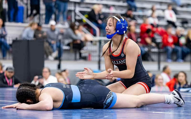 Karlee Brooks (AZ) celebrates her 53 kg semifinals win over Ava Ward (MO).