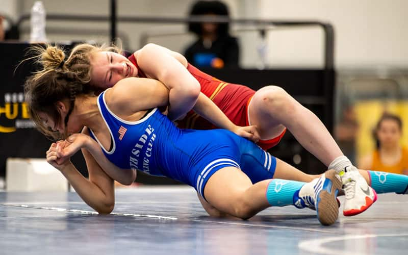 Emma Bacon (PA) controls Kayla Batres (CT) in the 50 kg finals of the USMC Women's U15 National finals.