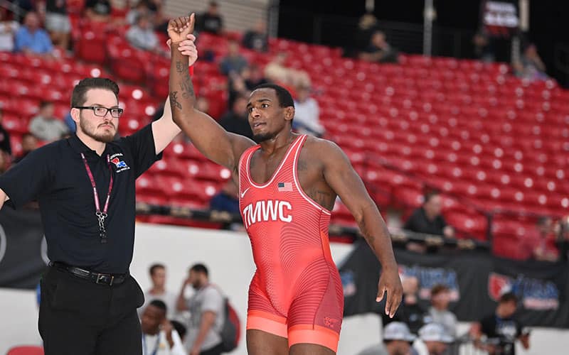 J'den Cox has arm raised at 2023 U.S. Open