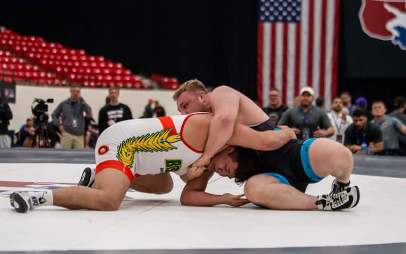Christian Carroll locks a front headlock at the U20 Freestyle quarterfinals