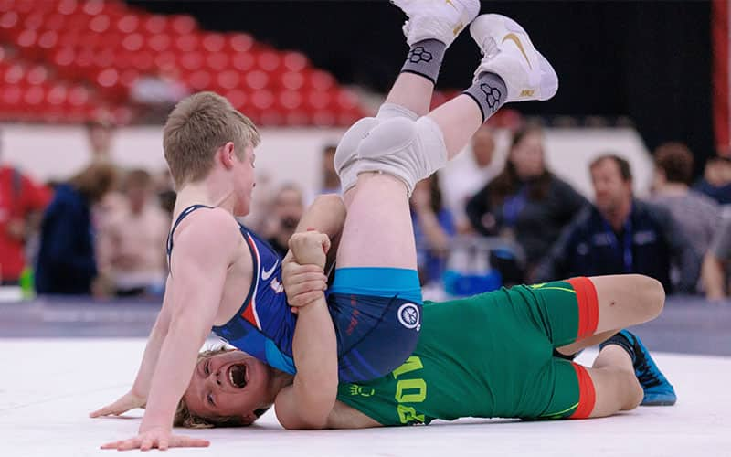 Arseni Kikiniou (CA) gets a throw during the U15 Greco-Roman Nationals finals.