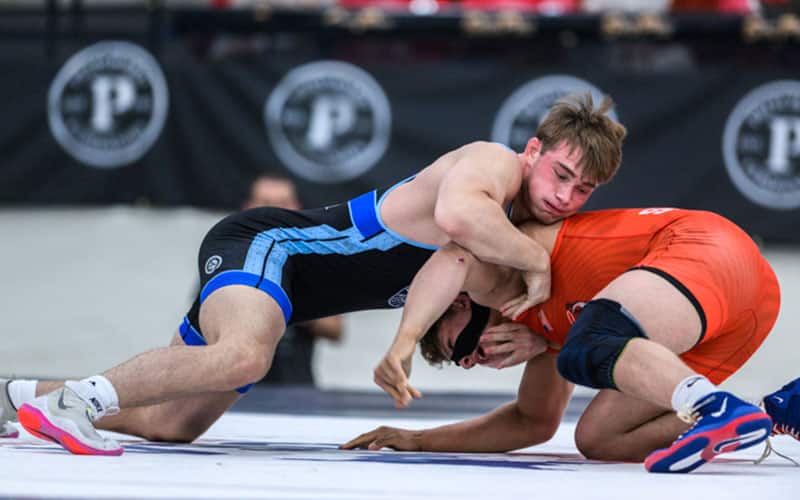 Sampson Stillwell (MO) controls Nicholas Sahakian of California in the 110-kg championship series