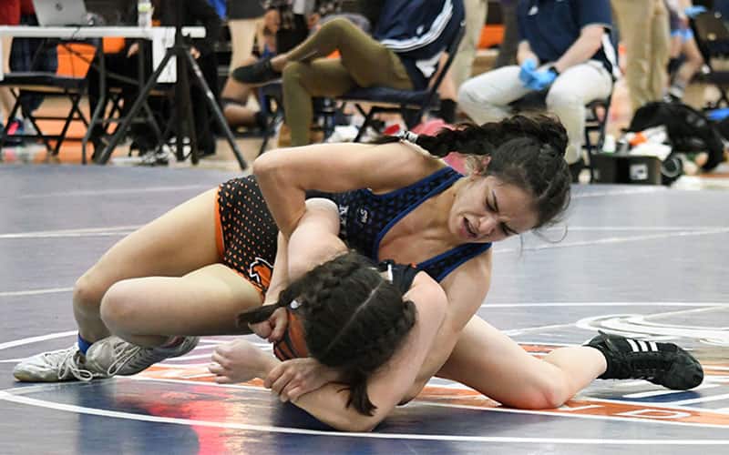 Esther Walker (Midland) runs an arm bar